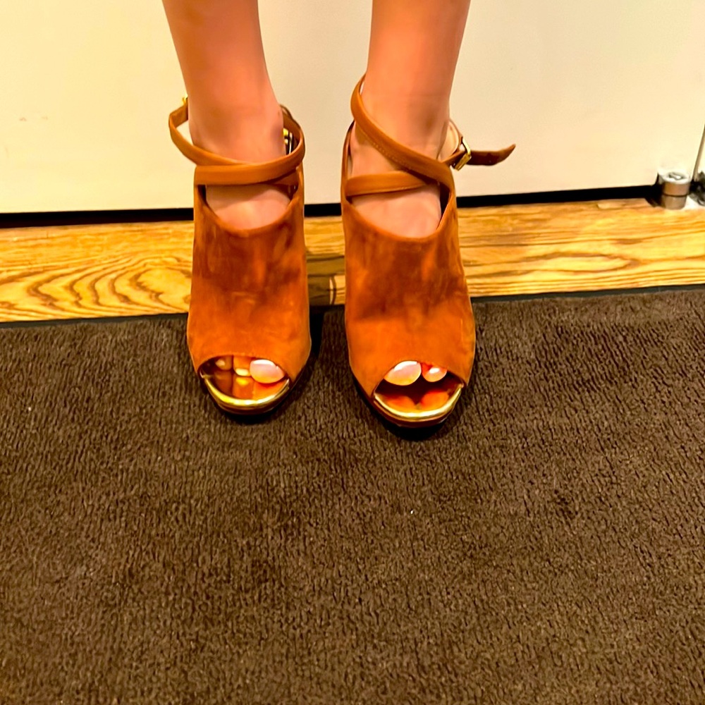 Almost new pair of Christian Loubiton tan suede